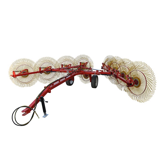Грабли для сена с пальцевыми колесами на тракторе Грабли для сена с пальцевыми колесами на тракторе
